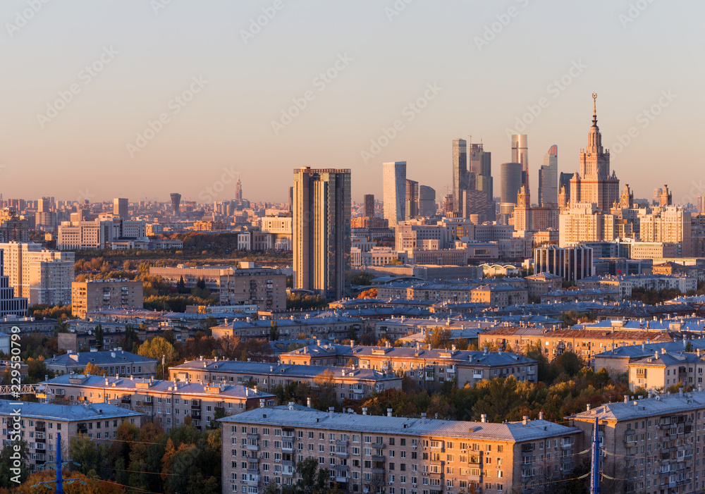 Moscow, Russia, view of the business center, Moscow University, and old houses, at sunset, autumn
