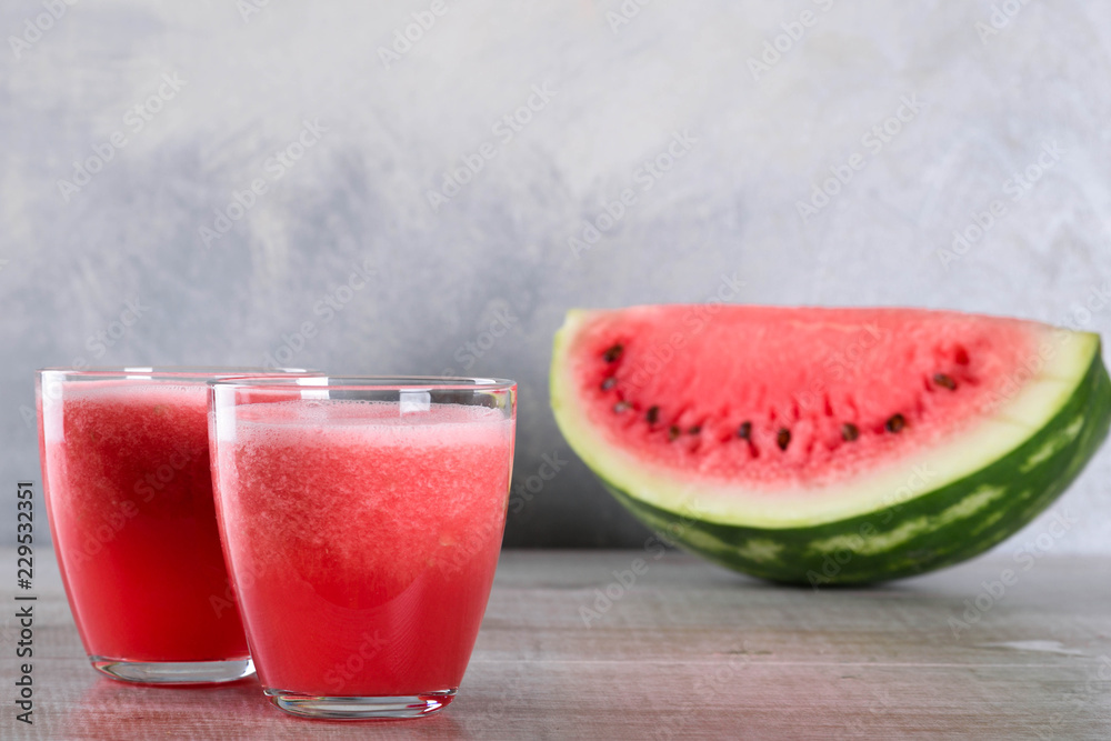 Watermelon smoothie on wood background , healthy drink. Summer. Watermelon pieces. Watermelon smoothie on wood background , healthy drink. Summer. Watermelon pieces.