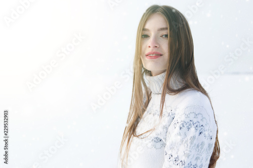 Winter young woman portrait. Beautiful young woman laughing outdoors. Enjoying nature, wintertime