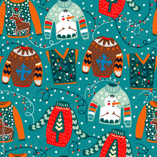 Cozy winter sweaters. Hand drawn colored vector seamless pattern. Blue background