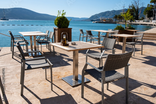 Restaurant table overlooking the mediterranean sea summer view.