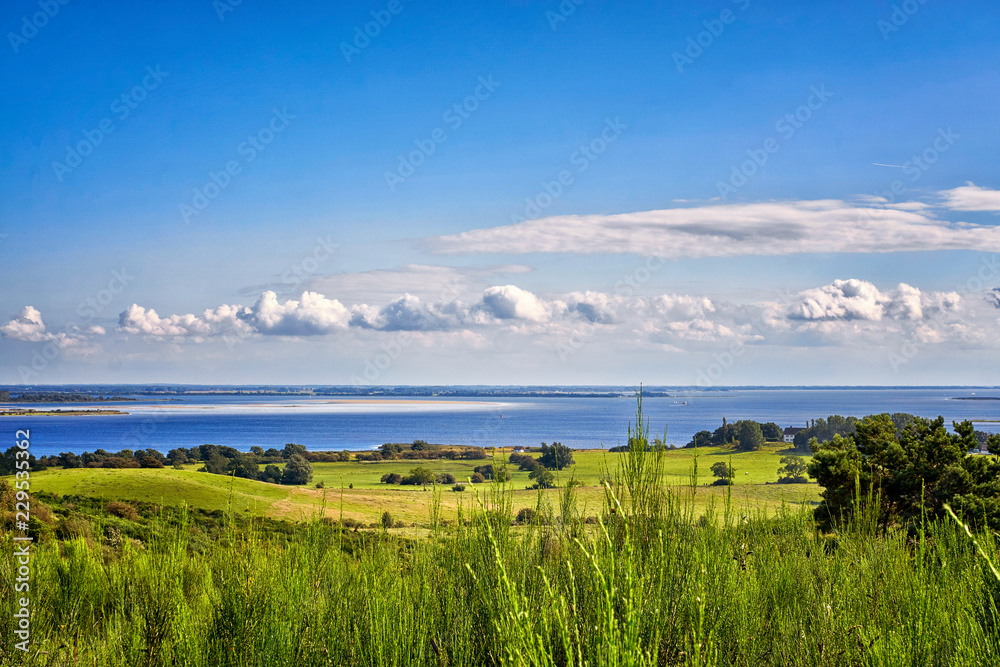 Landscape and Baltic Sea with clouds on the island Hiddensee. Panorama of Hiddensee.