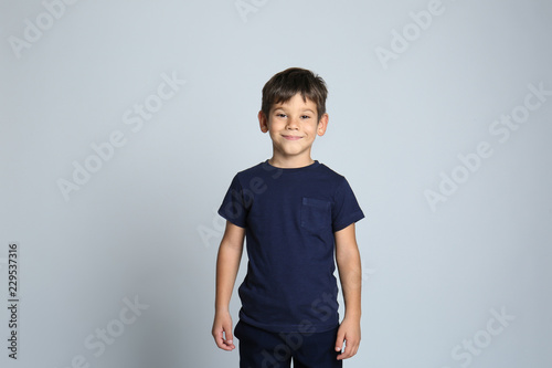Cute little boy in t-shirt ...