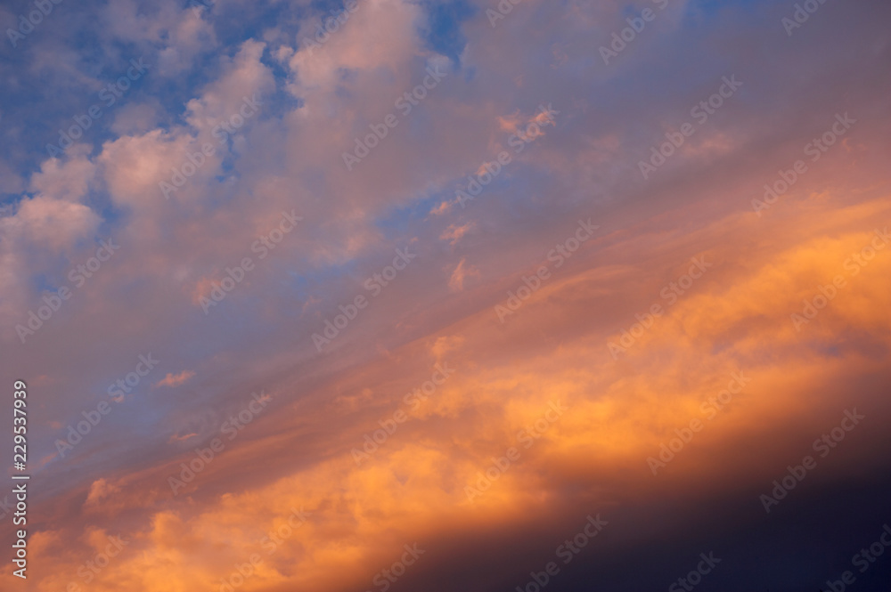 RED AND ORANGE CLOUDS AT SUNSET