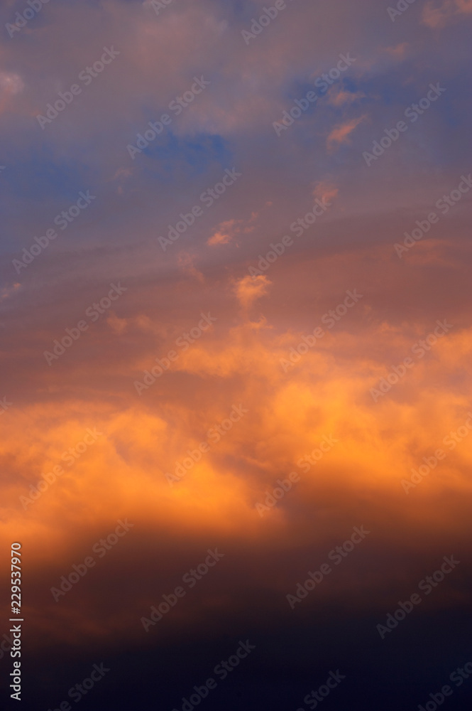 RED AND ORANGE CLOUDS AT SUNSET