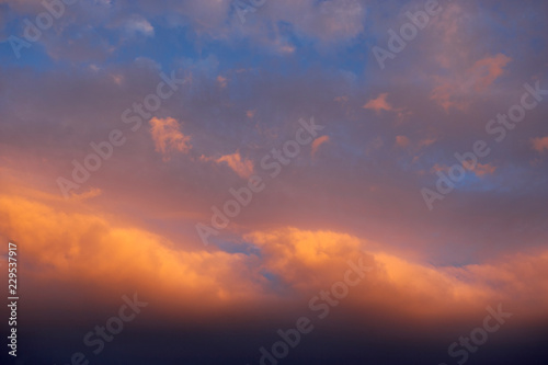 RED AND ORANGE CLOUDS AT SUNSET