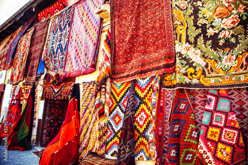 Amazing traditional handmade turkish carpets in souvenir shop.