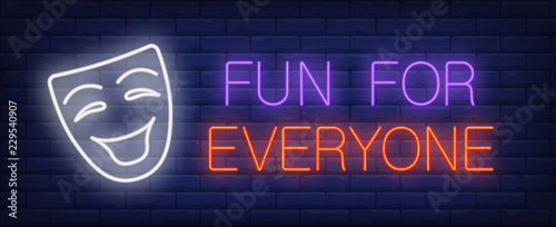 Fun for everyone neon text with smiling mask. Show invitation advertisement design. Night bright neon sign, colorful billboard, light banner. Vector illustration in neon style.
