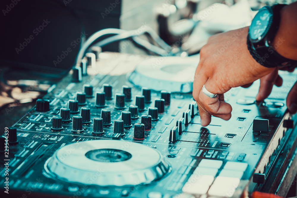 dj controller with hands of dj dj controller with hands of dj