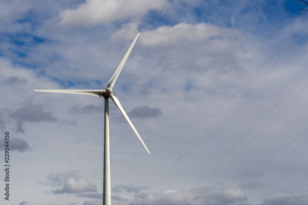 Wind turbine close up with cloudy sky in Quebec Wind turbine close up with cloudy sky in Quebec