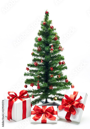 Christmas tree with red decorations © 1981 Rustic Studio