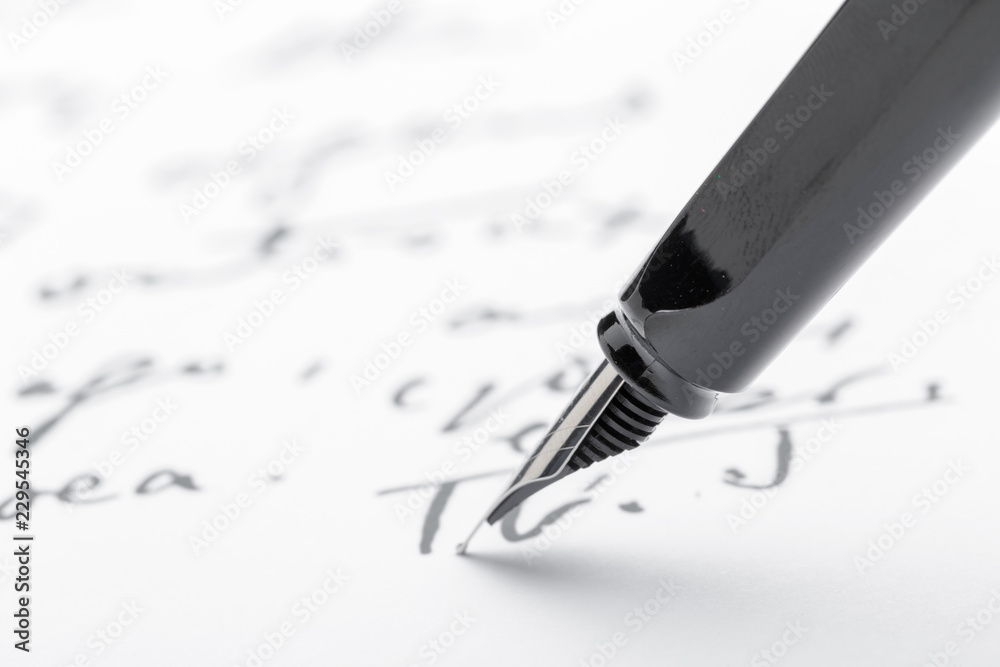 Fototapeta premium Fountain Pen on Written Page