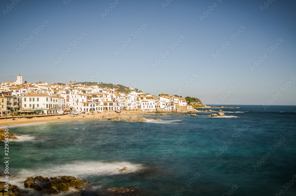 Coastal fishing town of Callela de Palafrugell with white houses, Catalania / Spain