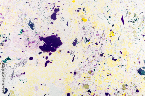 Abstract background for text or image. Ebru technique. Modern art. Marbled paper. Marbleized effect. Marble paper texture. Yellow and violet. © Kyrylo