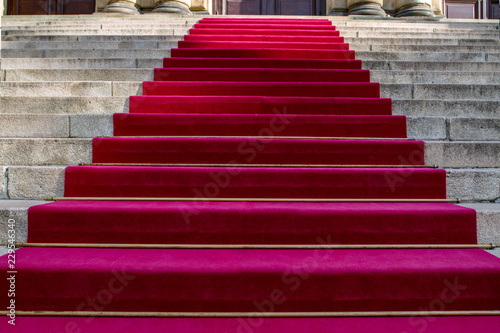  Long red carpet on the  stair  . Concept of Success. Triumph. Red carpet, luxury entrance celebrity.