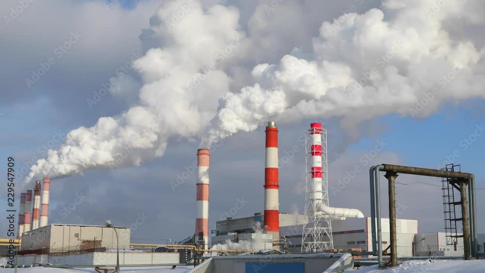 Energy generation and environmental pollution. Smoke from pipes of the plant. Clouds of white smoke. Energy generation and environmental pollution. Smoke from pipes of the plant. Clouds of white smoke.