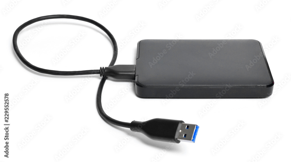 External hard disk with cable, isolated on white background. Small modern hard drive, PC security. External hard disk with cable, isolated on white background. Small modern hard drive, PC security.