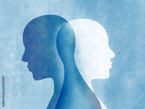 Bipolar disorder mind mental. Split personality. Mood disorder. Dual personality concept. Silhouette on blue background