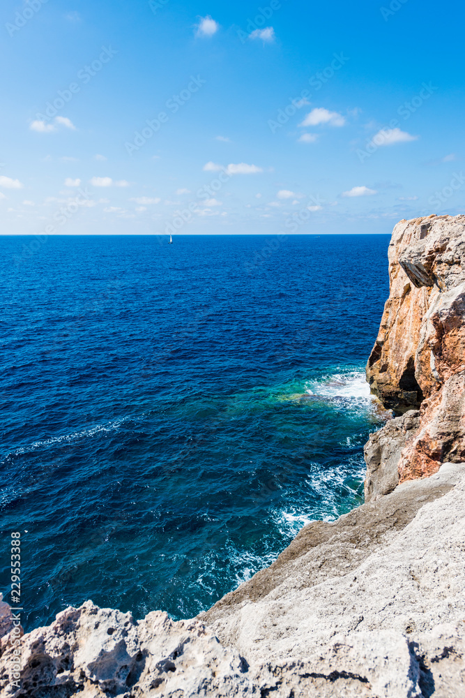 Binidali cliffs in Minorca, Balearic Islands, Spain. Binidali cliffs in Minorca, Balearic Islands, Spain.