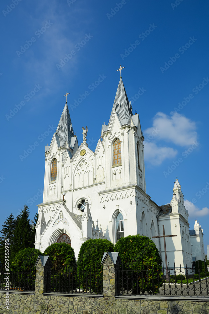 St. Anna Roman Catholic Church in Bar, Ukraine. Stone religious building of Christian Cathedral in neo-Gothic style.