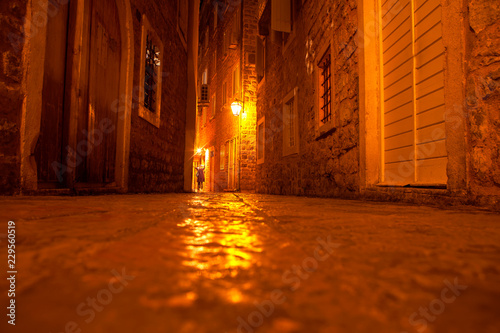 cobblestone road and walls in old town   night scene