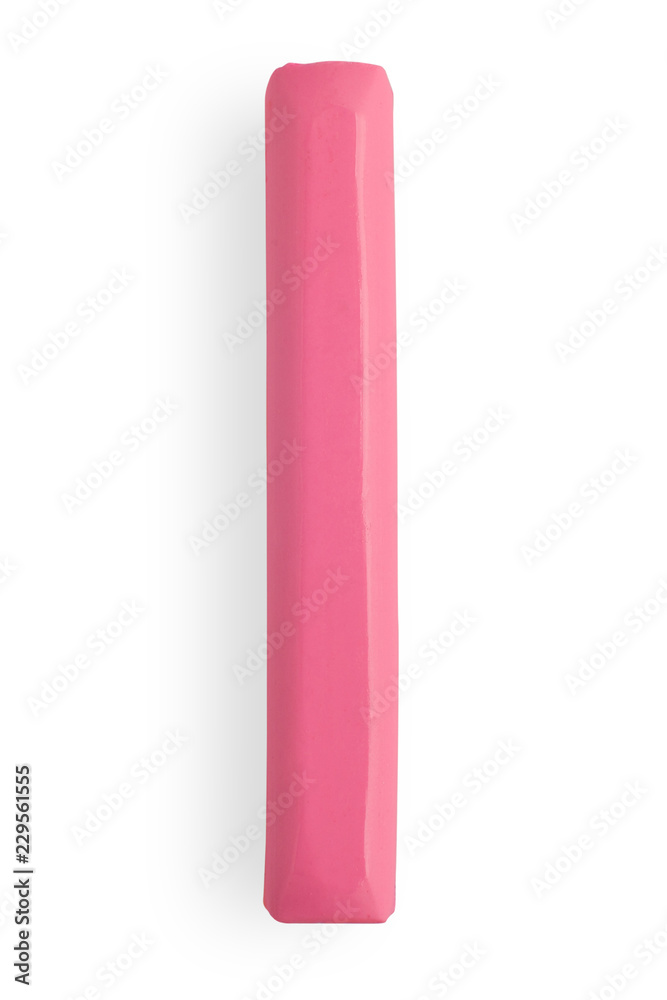 pink piece of plastic on a white background pink piece of plastic on a white background