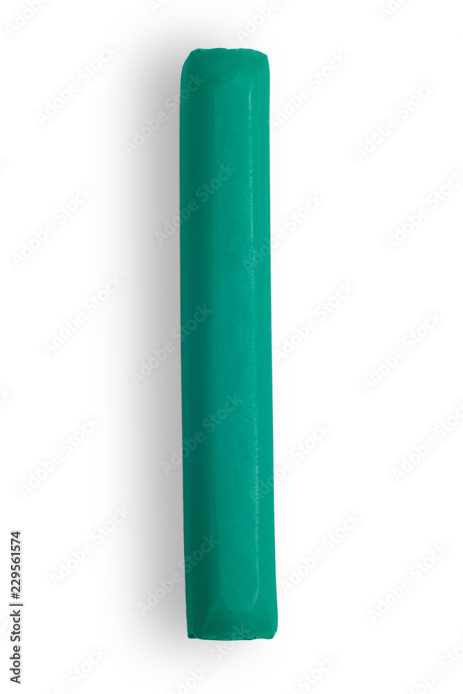 turquoise piece of plastic on a white background turquoise piece of plastic on a white background