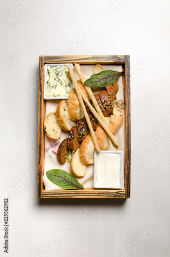 Breadbasket in a wooden plate