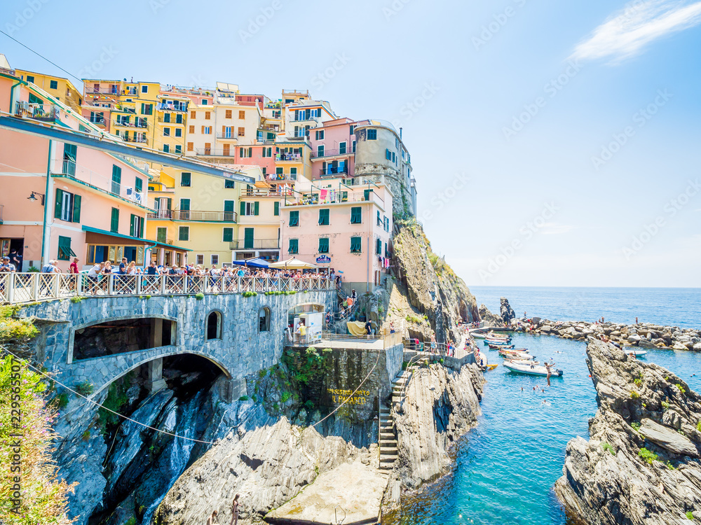 Manarola, Italy - Jun 17, 2018: Ancient village in Cinque Terre, Italy in the province of La Spezia, situated in a small valley in the Liguria region of Italy