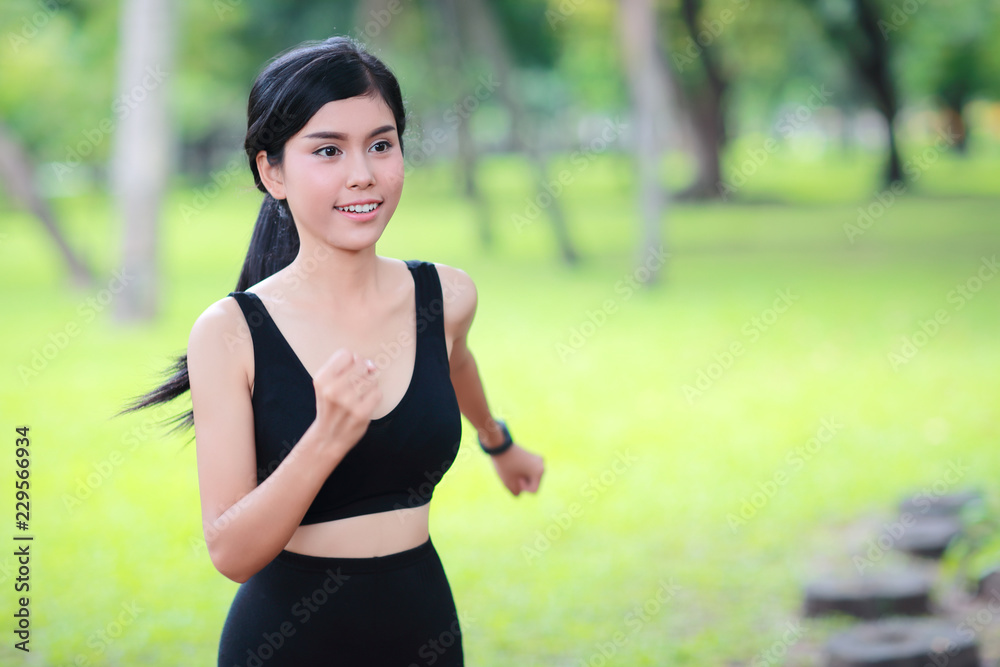 young healthy and sporty woman jogging in the park young healthy and sporty woman jogging in the park