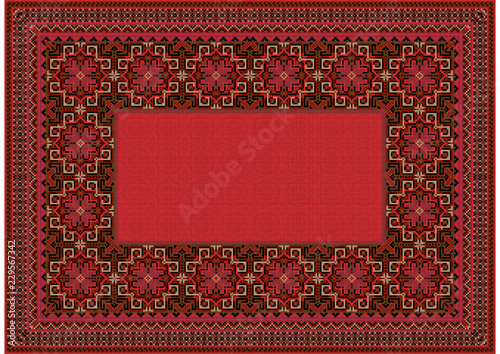 The pattern of a luxury old oriental carpet with red,brown and beige shades on black background
