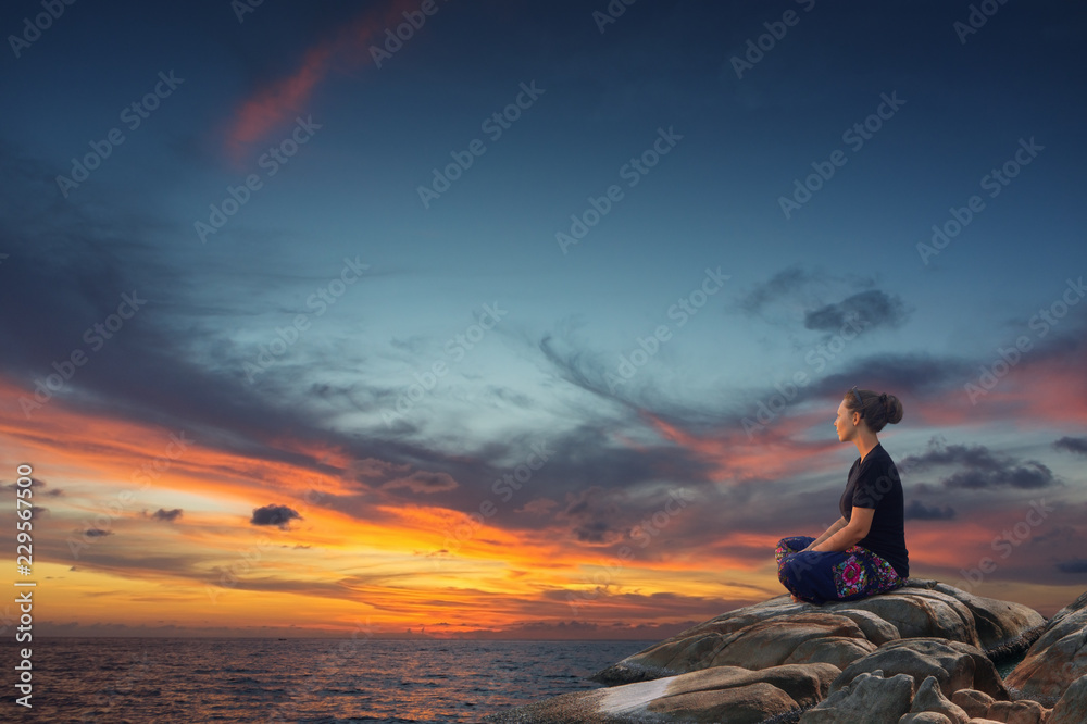Young woman relaxing at sea Young woman relaxing at sea