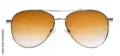 Gold colored sunglasses, isolated on white background. Golden sunglasses with toned glass. Front view.