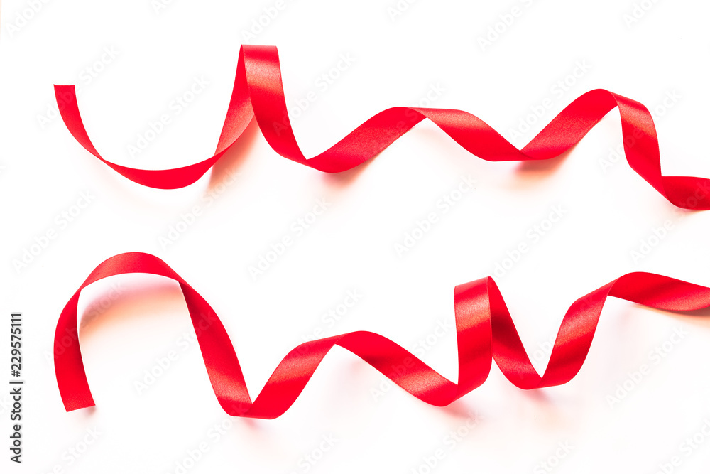 Red bow ribbon satin texture isolated on white background with clipping path