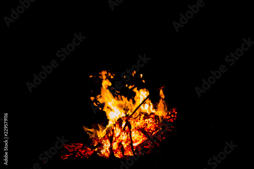 Forest fire silhouette Black background light