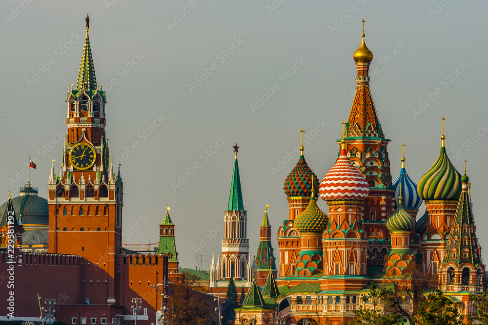 Spasskaya tower of Moscow Kremlin and Saint Basil’s cathedral Spasskaya tower of Moscow Kremlin and Saint Basil’s cathedral