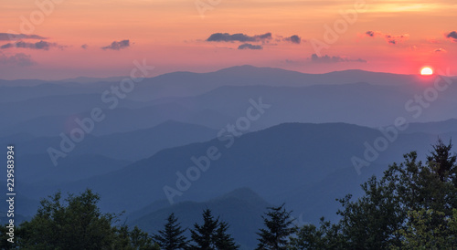 Great Smoky Mountains National Park, North Carolina, USA - July 4, 2018: Mountain layers full of colorful foliage right after sunset in the Great Smoky Mountains
