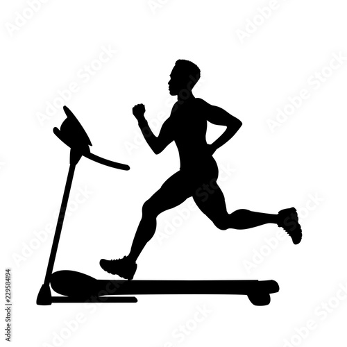 silhouette of male runner on a treadmill