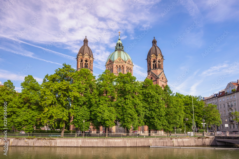 Fototapeta premium Munich Germany, city skyline at Saint Lukas Church and Isar River