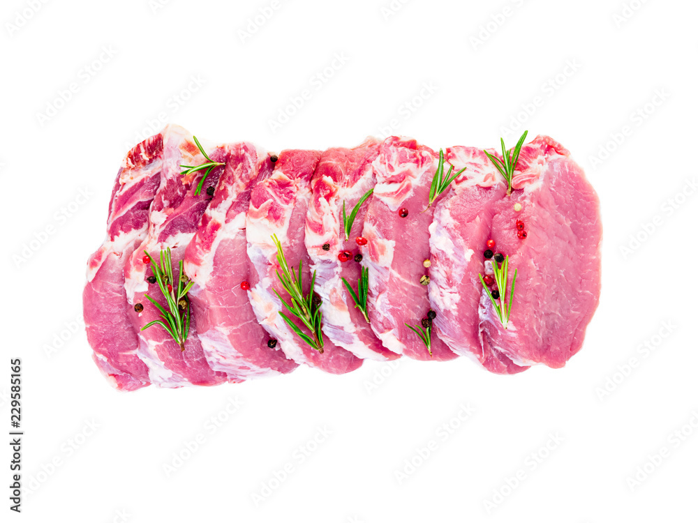Obraz premium pork meat slices loin with seasoning isolated on white background, top view