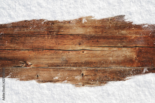 Christmas rustic wood background with snow