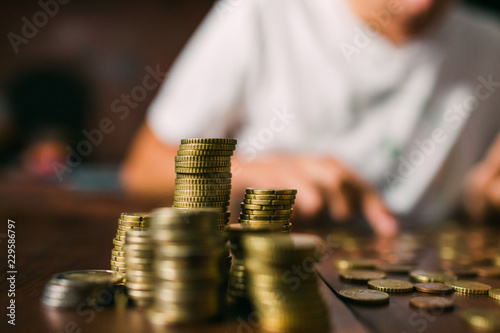 Crop guy counting coins photo