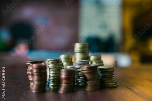 Stacks of various coins photo