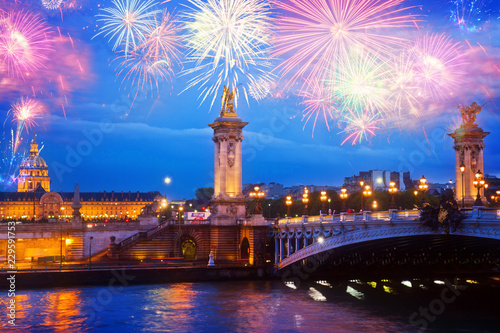 Alexandre III Bridge, night with fireworks in Paris, France