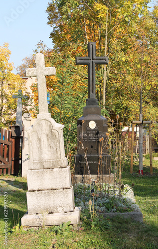 some old tombstones on the cemetery in Ostrava - Hrabova, Czech Republic photo