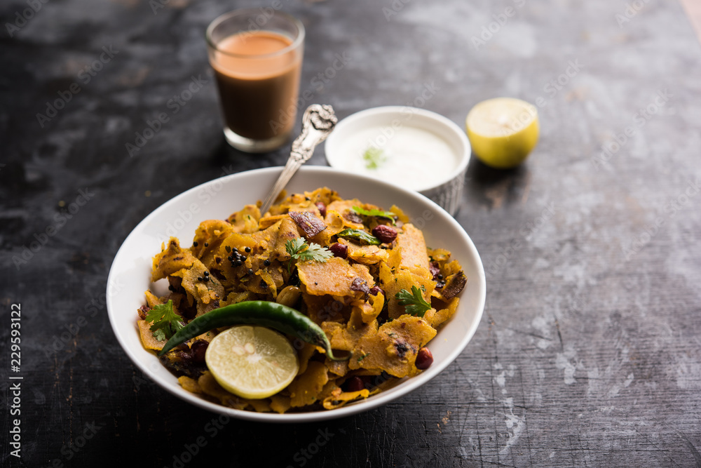 Homemade Kothu Parotta/ Paratha or Stir Fried Leftover Chapati Masala or fodnichi poli in marathi, served in a bowl or plate with curd and hot tea. Selective focus Homemade Kothu Parotta/ Paratha or Stir Fried Leftover Chapati Masala or fodnichi poli in marathi, served in a bowl or plate with curd and hot tea. Selective focus