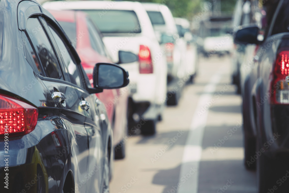 Fototapeta premium traffic jam in a city street road row outdoors of car on express way in rush hour. transportation travel concept. 
