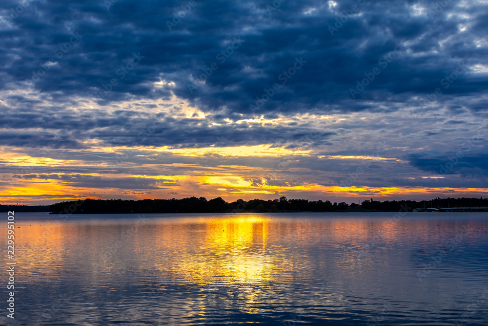 Fototapeta premium Sunset over a lake.