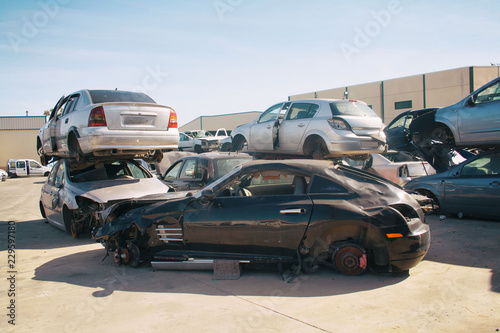 A graveyard of cars, broken cars sell on spare parts.