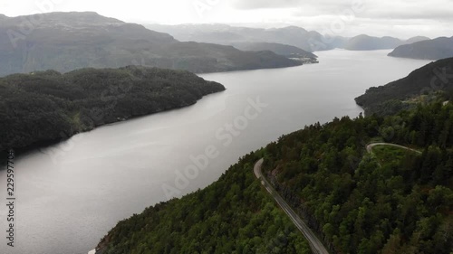 Aerial view. Norwegian landscape. Green mountains hills and fjord Saudafjord on cloudy summer day, overcast weather. National tourist Ryfylke route photo